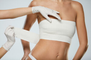 Female Body In White Panties And Breast Bandages Female Body In White Panties And Breast Bandages